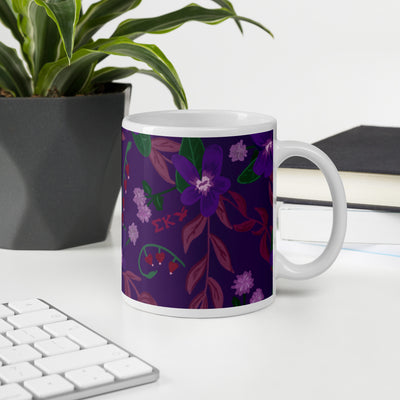 Sigma Kappa violet floral print mug shown in violet in office setting in 11 oz size