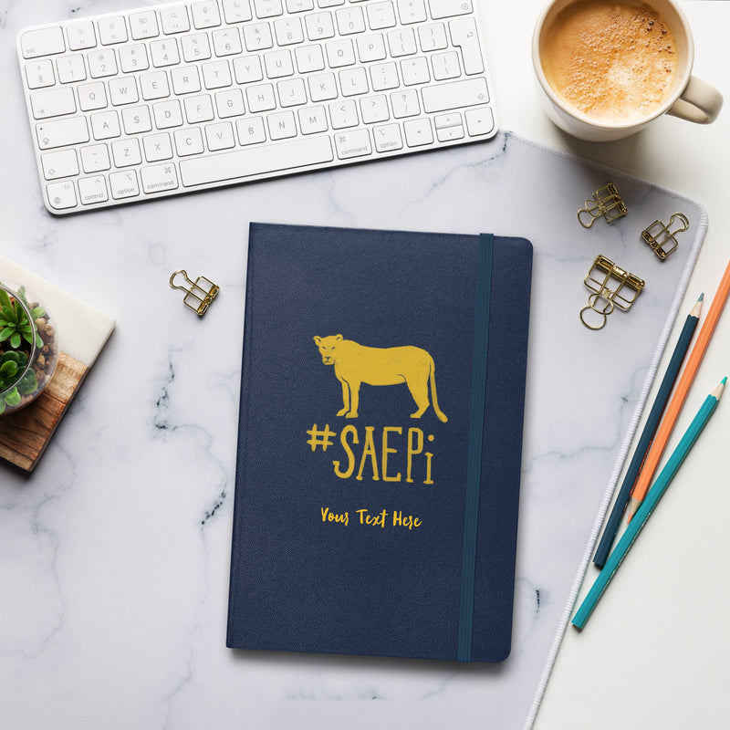 Sigma Lioness Hardcover Journal Book in office setting in Navy Blue