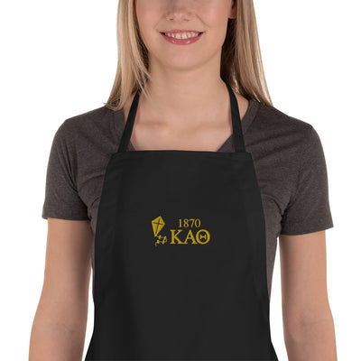 Theta embroidered kite apron in black