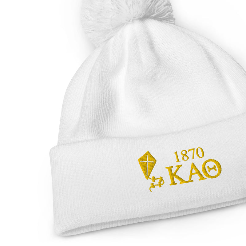 theta embroidered beanie in white in detail view