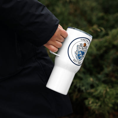 Theta Xi Fraternity travel mug in model's hand