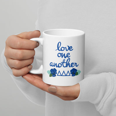 Tri Delta Double-Sided Mothers Day 11 oz Mug with motto and filled letters shown in model's hands