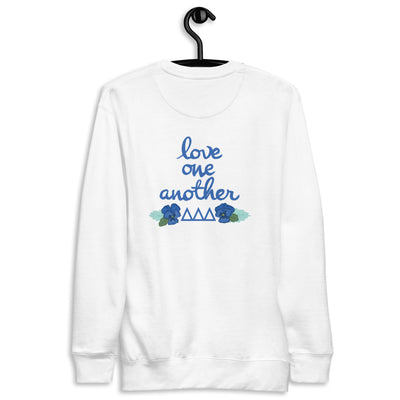 Tri Delta Sorority Sweatshirt shown hang9ing on a hanger