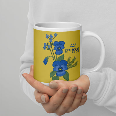 Tri Delta 1888 Sorority Mug in 20 oz size with 1888 design and letters in model's hands