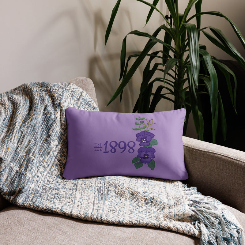 Tri Sigma 1898 lumbar pillow in 20" x 12" size showing front of pillow on couch