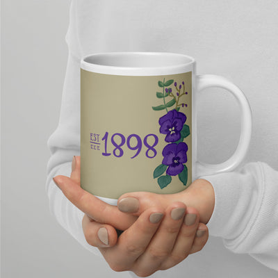 Tri Sigma 1898 Sorority Mug shown in full view in 20 oz size in model's hands