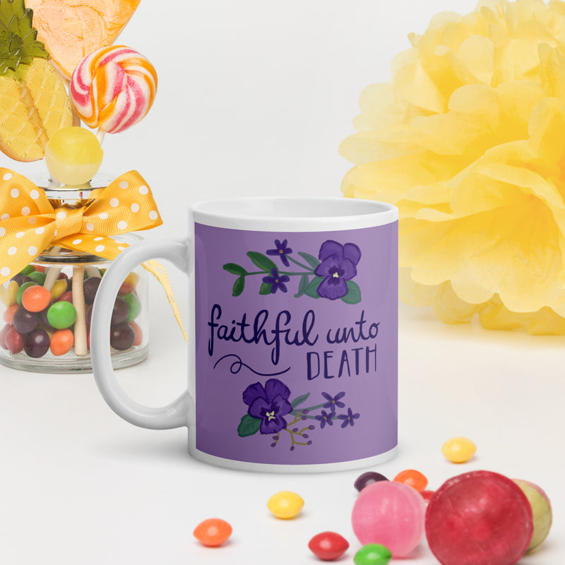 Tri Sigma Motto mug in 11 oz size shown in lifestyle setting