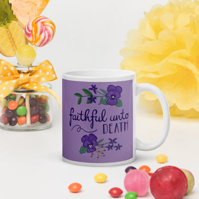 Tri Sigma Motto mug in 11 oz size shown in lifestyle setting