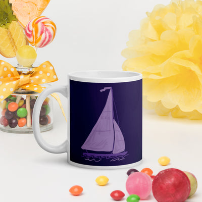 Tri Sigma sailboat mug in 11 oz size shown in colorful lifestyle setting