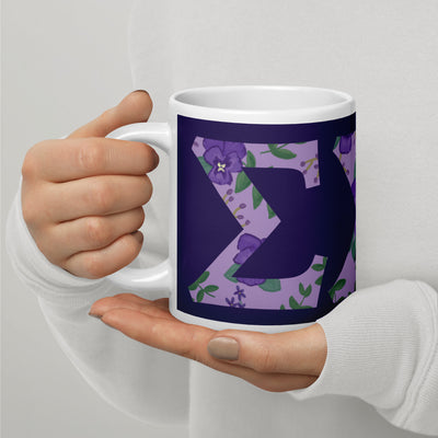 Tri Sigma Sorority Letters Mug in 20 oz size in purple shown in model's hands