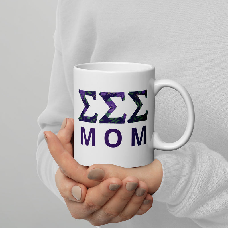 Tri Sigma Sorority Mom Mug showing filled letters in 11 oz size in model&