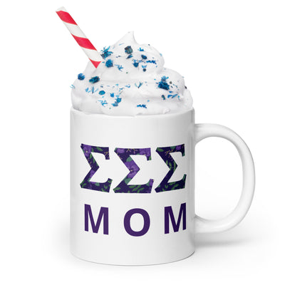 Tri Sigma Sorority Mom Mug showing filled letter design in 20 oz size in lifestyle setting
