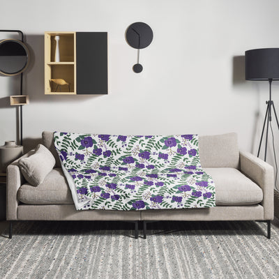 Tri Sigma Violet Print Minky Blanket shown in 50" x 60" size on couch