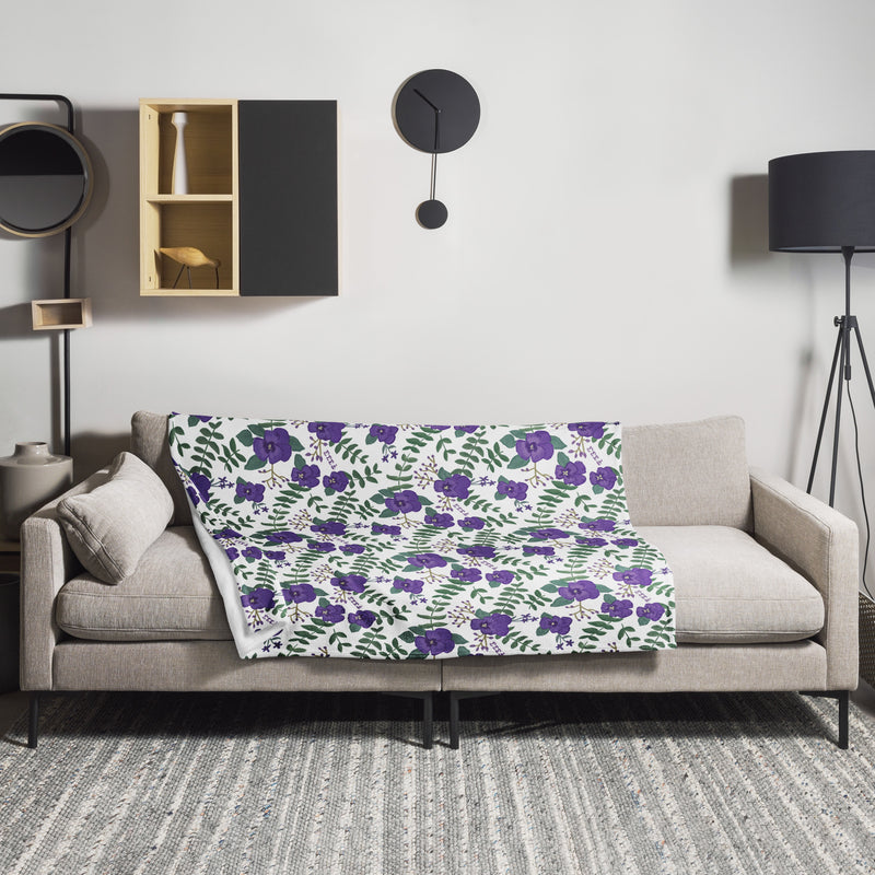 Tri Sigma Violet Print Minky Blanket shown in 50" x 60" size on couch