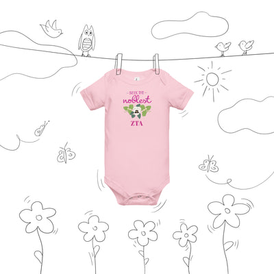 Zeta Tau Alpha Baby Onesie shown in pink on clothesline with cute graphic