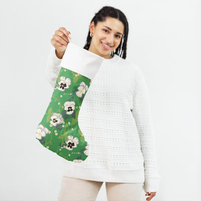 Zeta White Violet Floral Print Holiday Stocking in model's hand
