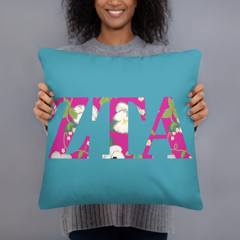 Zeta Tau Alpha Letters Pillow in turquoise in 18" x 18" size shown in model&