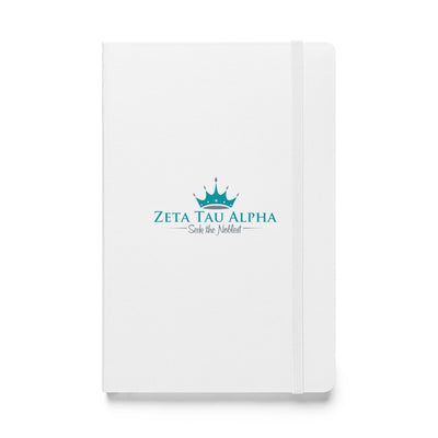 ZTA Logo and Motto Journal shown in white in full size view