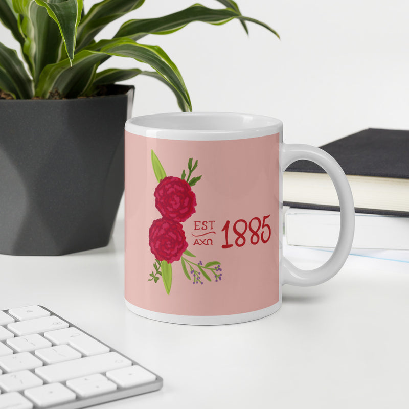 Alpha Chi Omega 1885 Pink Glossy Mug shown in office environment
