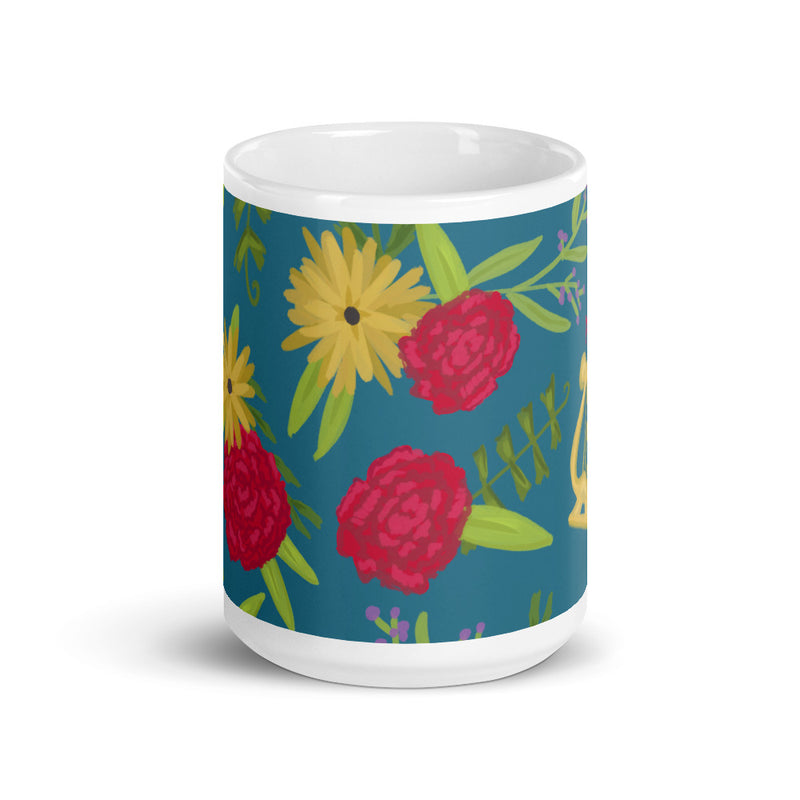 Alpha Chi Omega Floral Print Teal Glossy Mug in 15 oz size showing design wrapping around mug