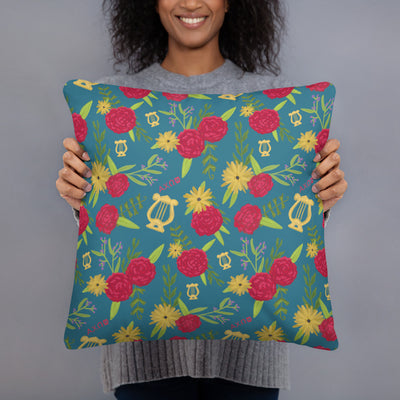 Alpha Chi Omega Together Let Us Seek the Heights Teal Pillow showing back of pillow with carnation floral print