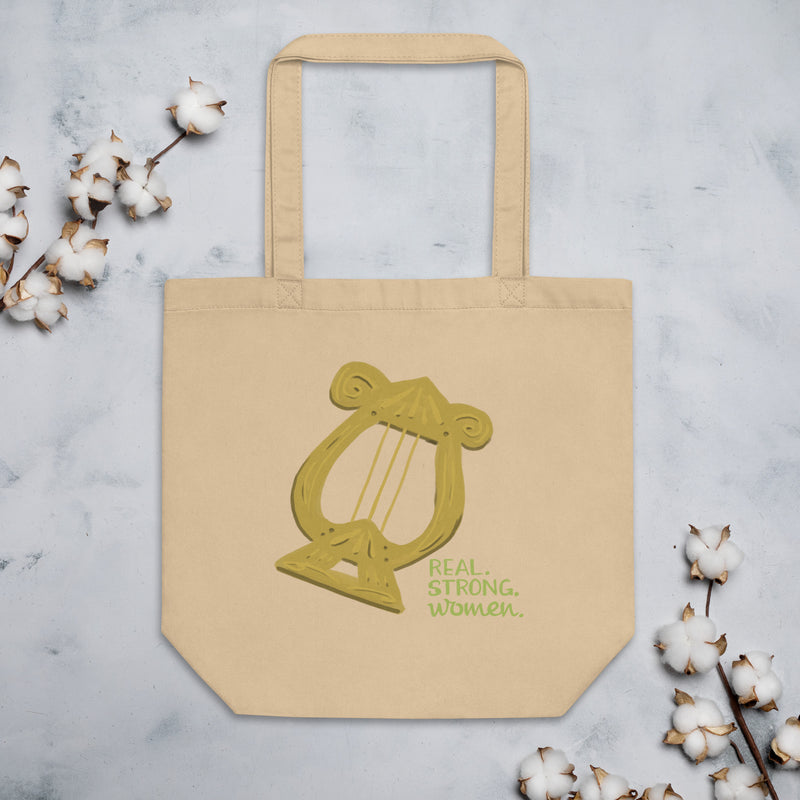 Alpha Chi Omega Real. Strong. Women Eco Tote Bag in natural oyster color shown with cotton flowers