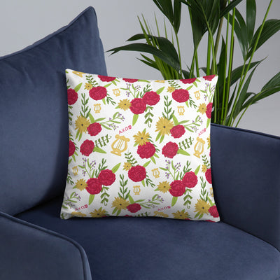 Alpha Chi Omega Red Carnation Floral Print Pillow, White shown on blue chair