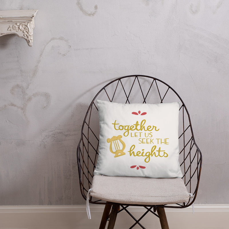 Alpha Chi Omega Together Let Us Seek The Heights White Pillow shown on chair