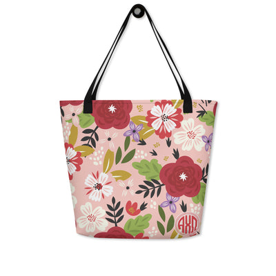 Alpha Chi Omega Modern Floral Print Tote Bag in Hera Pink with Monogram shown on hook