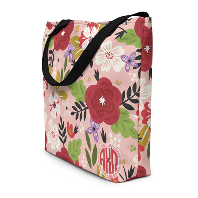 Side view of Alpha Chi Omega Modern Floral Print Tote Bag in Hera Pink with Monogram