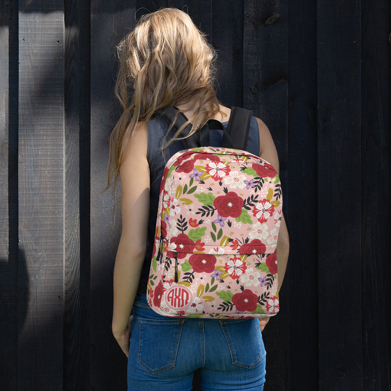 Alpha Chi Omega Modern Floral Hera Pink Backpack shown on woman&