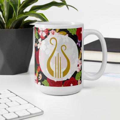 Alpha Chi Omega Modern Floral Print Ebony Mug with Lyre in 15 oz size in office environment
