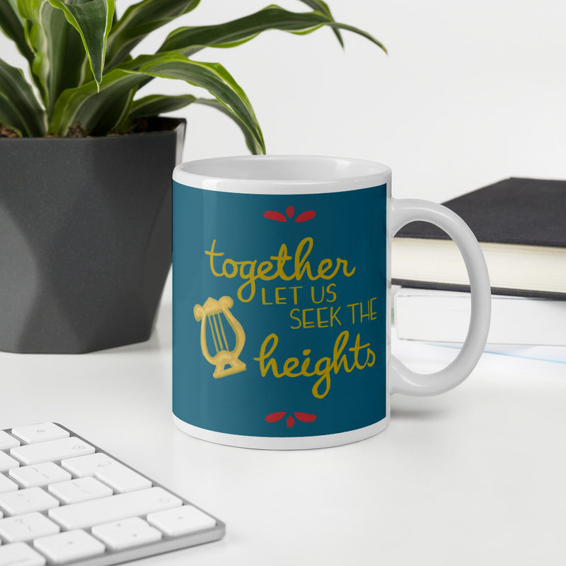 Alpha Chi Omega Together Let Us Seek the Heights Teal Mug shown in office environment