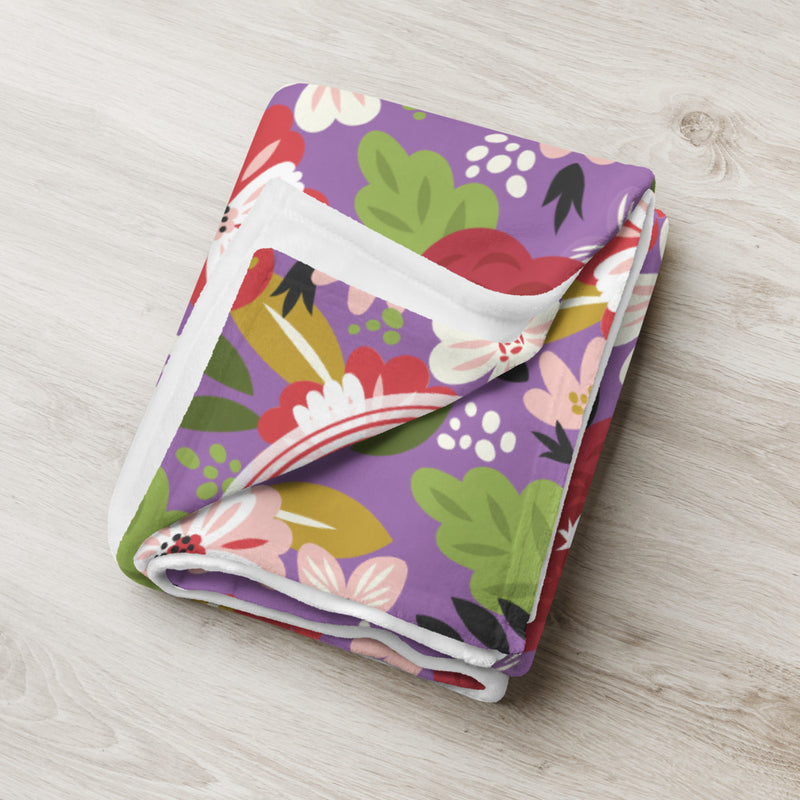Alpha Chi Omega Modern Floral Print blanket in Iris Purple shown folded.