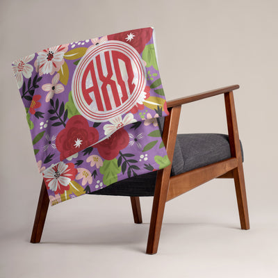 Alpha Chi Omega Modern floral throw blanket in a lifestyle photo.