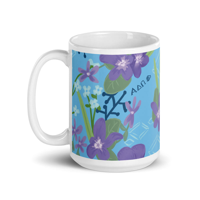 Our Alpha Delta Pi 15 oz. ceramic mug is in our artisan-created floral pattern, 