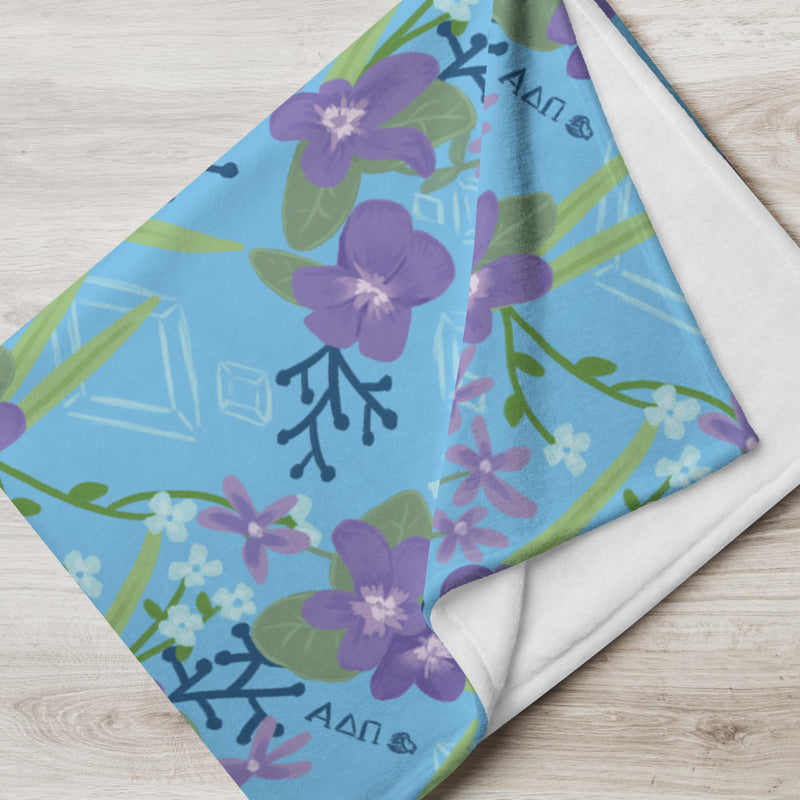 Alpha Delta Pi Violet Floral Print Blanket, Blue showing white backing