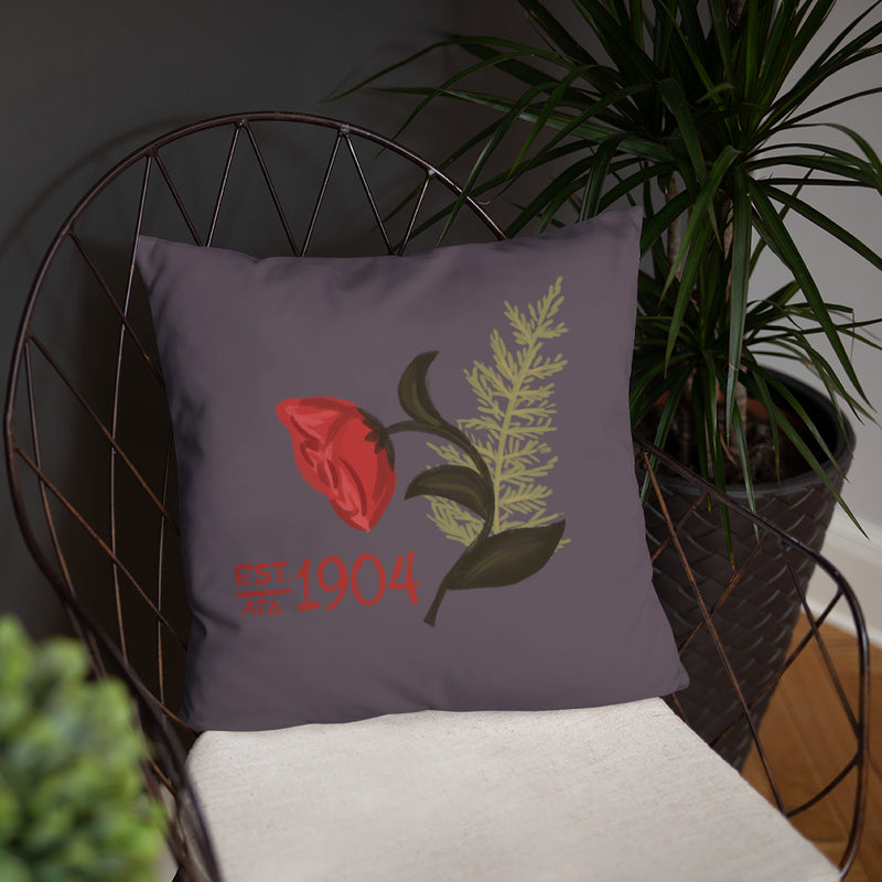 Alpha Gamma Delta 1904 Founding Date Pillow shown with plant