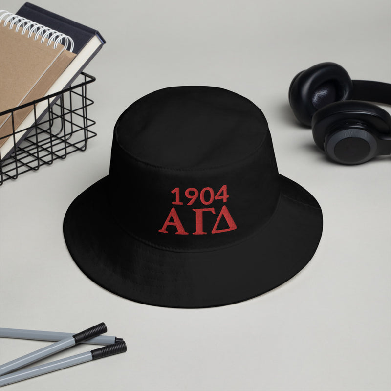Show your Alpha Gamma Delta spirit with our adorable Alpha Gam 1904 bucket hat! 
