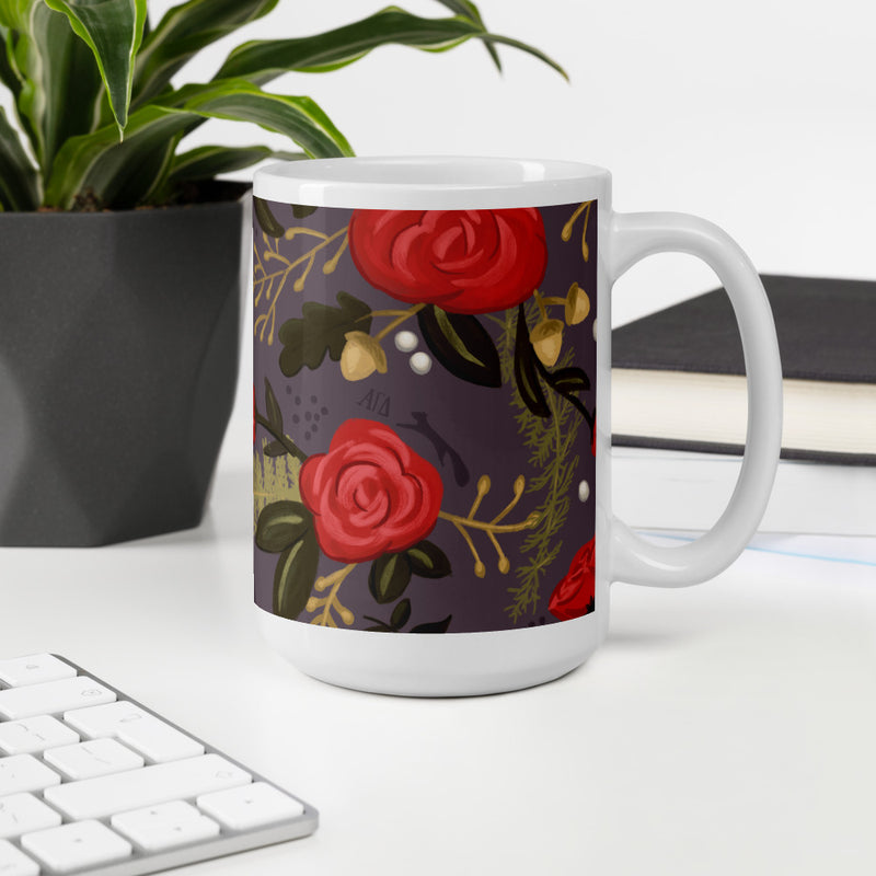 Alpha Gamma Delta Floral Pattern Glossy Mug in 15 oz size shown in office