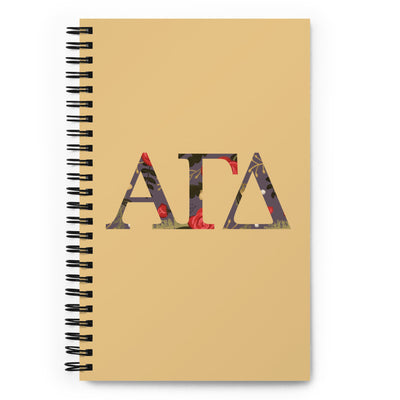 Alpha Gamma Delta Greek Letters Spiral Notebook shown in full view in gold