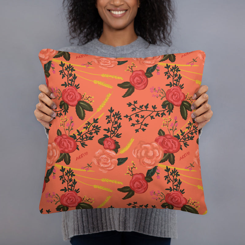 Alpha Omicron Pi 1897 Founding Date Pillow held up by model showing reverse floral print