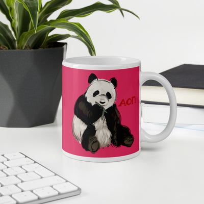 Alpha Omicron Pi Panda Pink Glossy Mug shown in 11 oz size in office