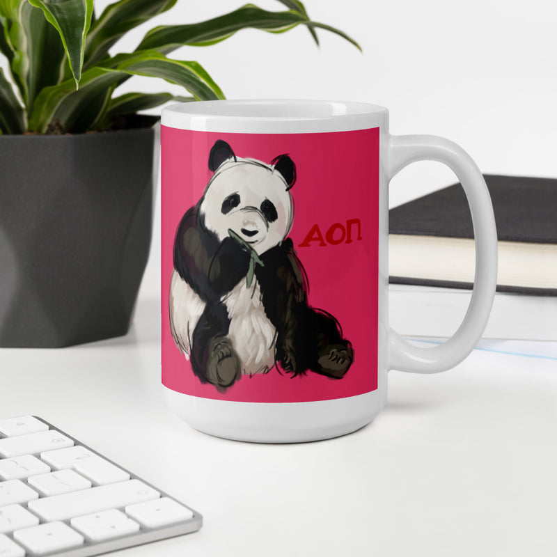 Alpha Omicron Pi Panda Pink Glossy Mug in 15 oz size shown in office