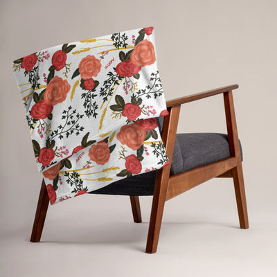 Alpha Omicron Pi Rose Print Throw Blanket shown on chair