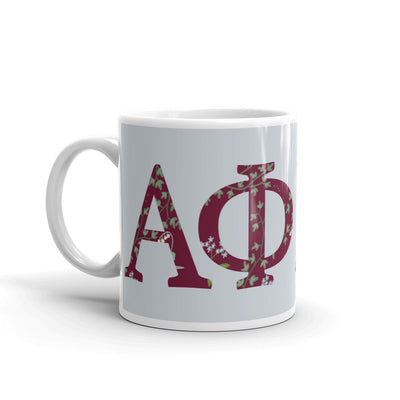 Alpha Phi Greek letters mug in Silver  with floral print filled letters.