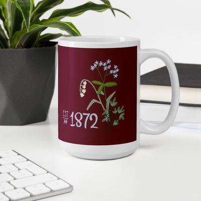 Our Alpha Phi 1872 ceramic 15 oz mug shown in office environment.