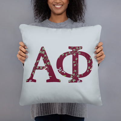 Alpha Phi Greek Letters Silver Pillow in model's hands
