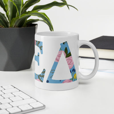 Alpha Xi Delta Letters Mug in 11 oz size shown in office setting