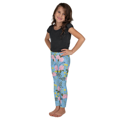 Alpha Xi Delta Rose Floral Print Kid's Leggings, Light Blue showing side view on child model